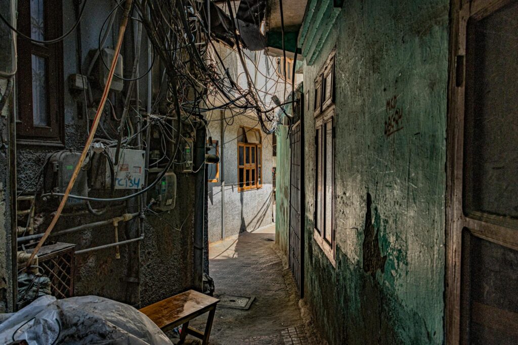 Explore the textured alleys of Majnu Ka Tilla, featuring rustic charm and architecture.