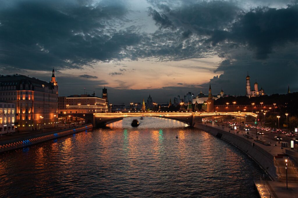 Stunning evening view of the Moscow Kremlin and Moskva River captured at sunset.