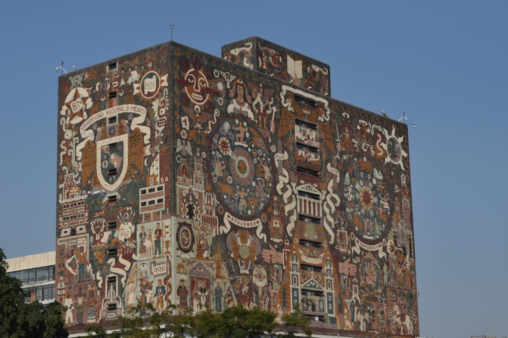 Explore the vibrant murals on the UNAM library in Mexico City, a cultural and architectural landmark.